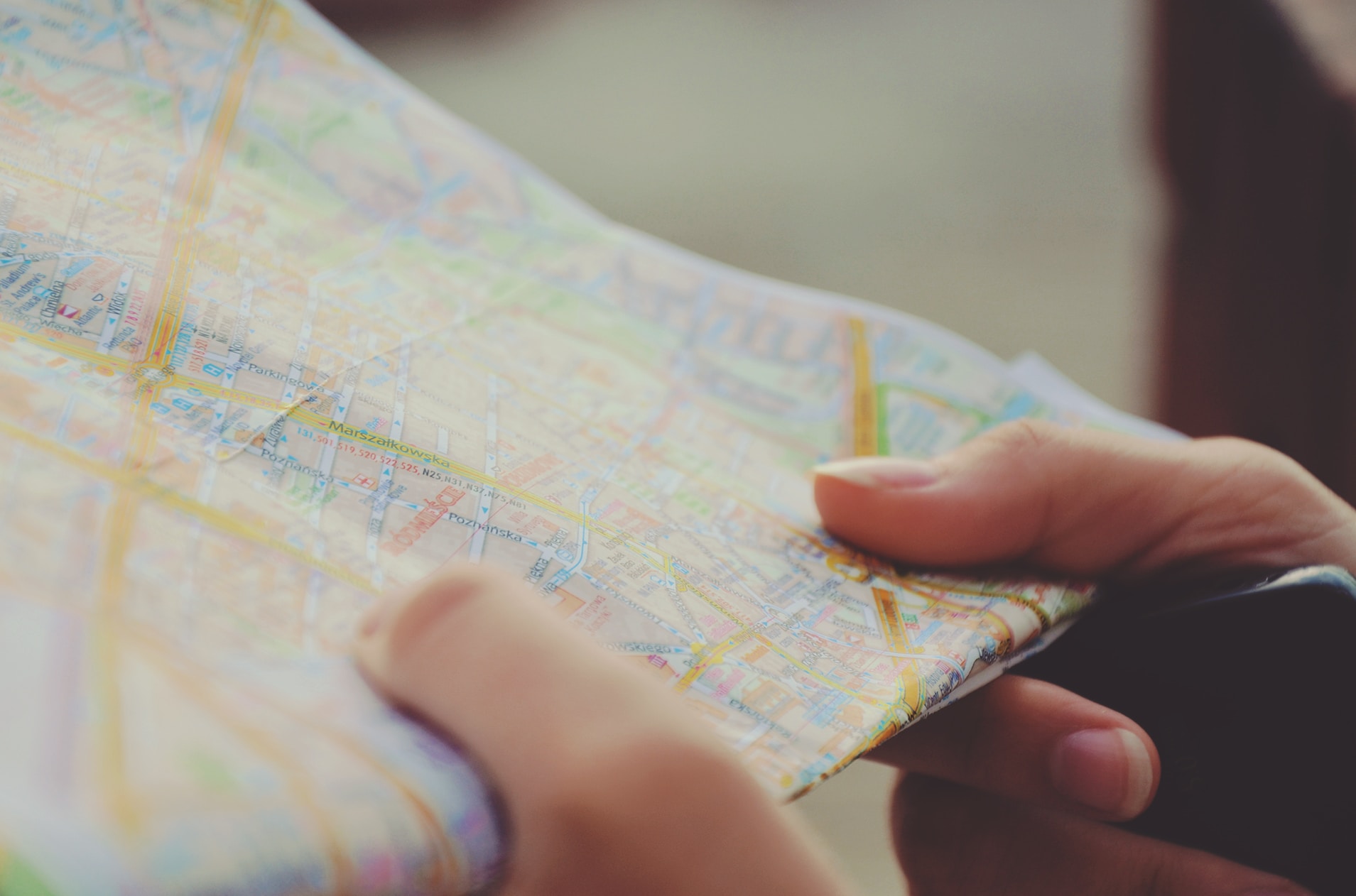 Map Hands holding an old-style roadmap